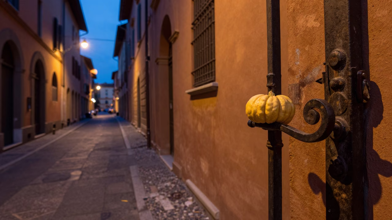 Twilight Street Scene in Bologna Italy with Gate Handle and Squash Blossoms in in Bologna, Italy