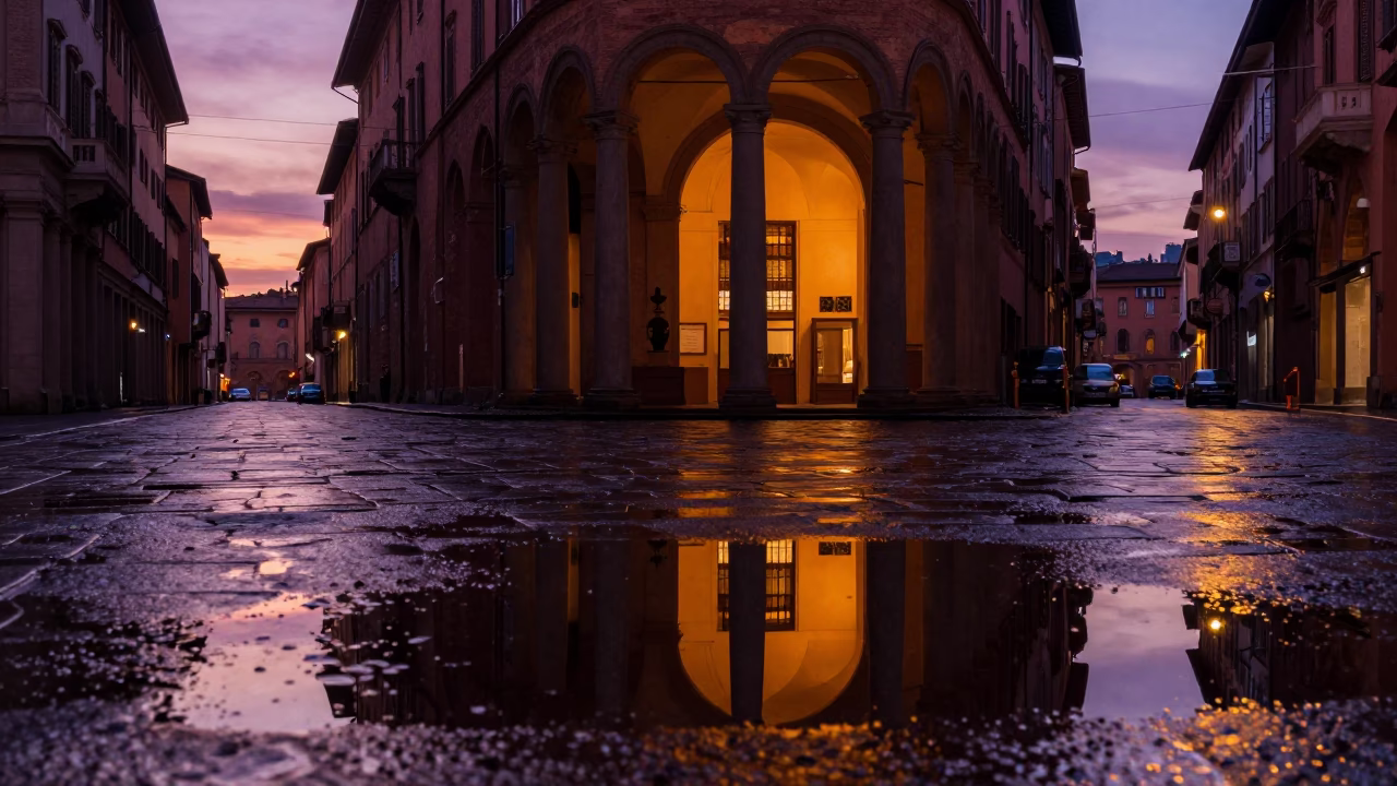 Twilight Street Scene in Bologna Italy with Puddle Reflections and Urban Details in in Bologna, Italy