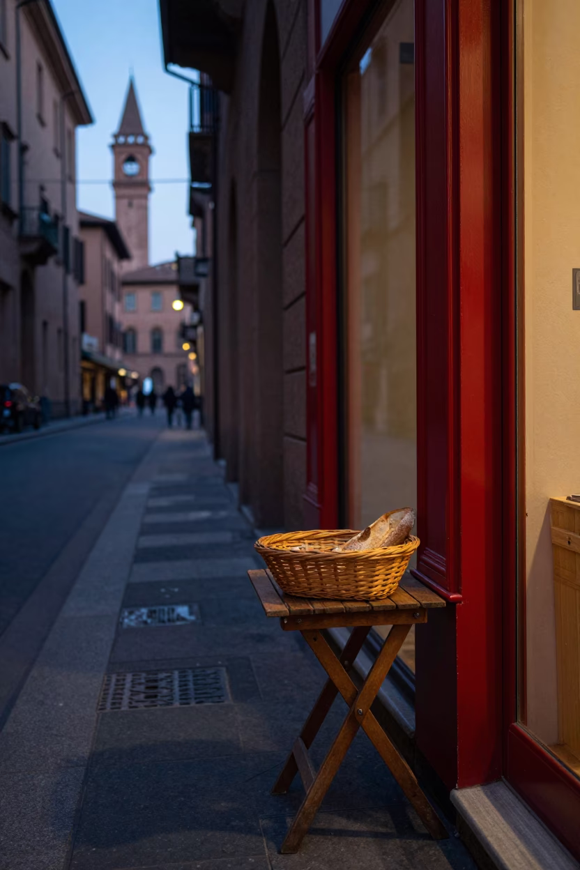 Twilight Street Scene in Bologna Italy with Red Lacquered Wood and Bread Basket in in Bologna, Italy