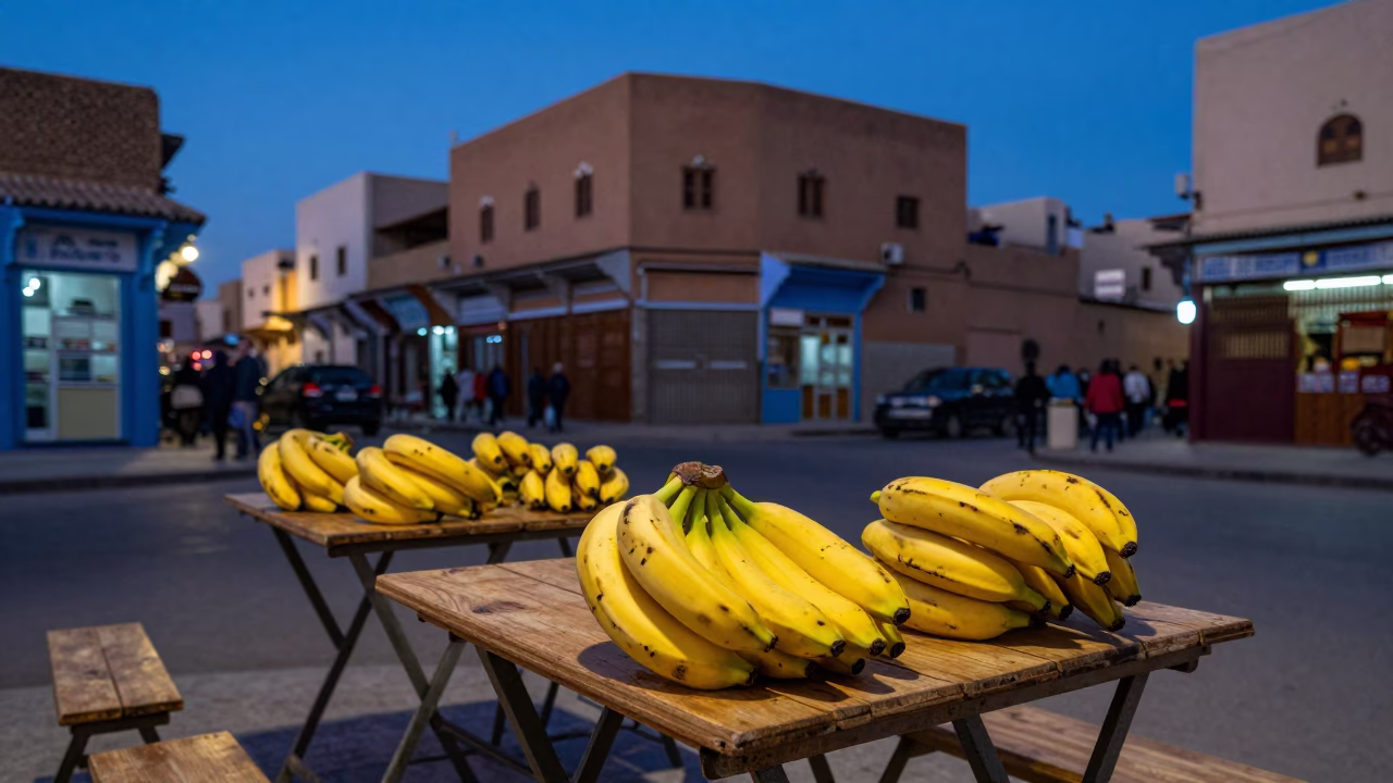 Twilight Street Scene in Casablanca Morocco with Folding Tables and Bananas in in Casablanca, Morocco