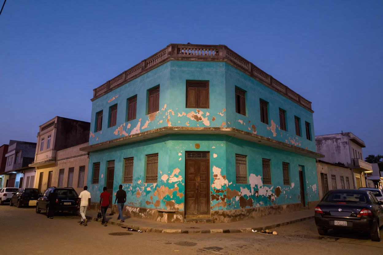 Twilight Street Scene in Dakar Senegal with Peeling Turquoise Paint and Local Life in in Dakar, Senegal