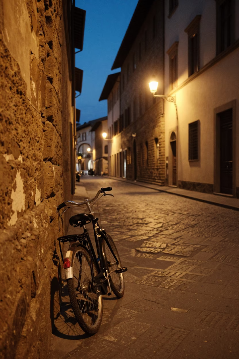 Twilight Street Scene in Florence Italy with Vintage Bicycle and Cobblestone Alleyway in in Florence, Italy