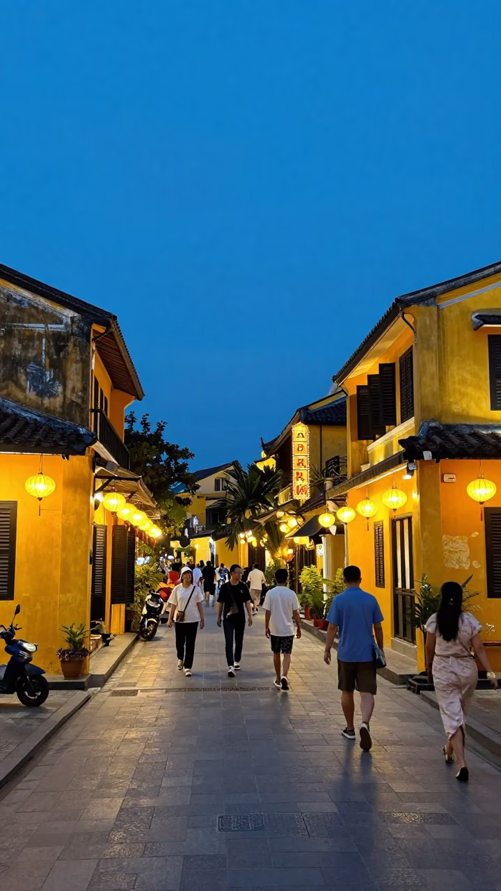 Twilight Street Scene in Hoi An Vietnam with Yellow Buildings and Lanterns in in Hoi An, Vietnam