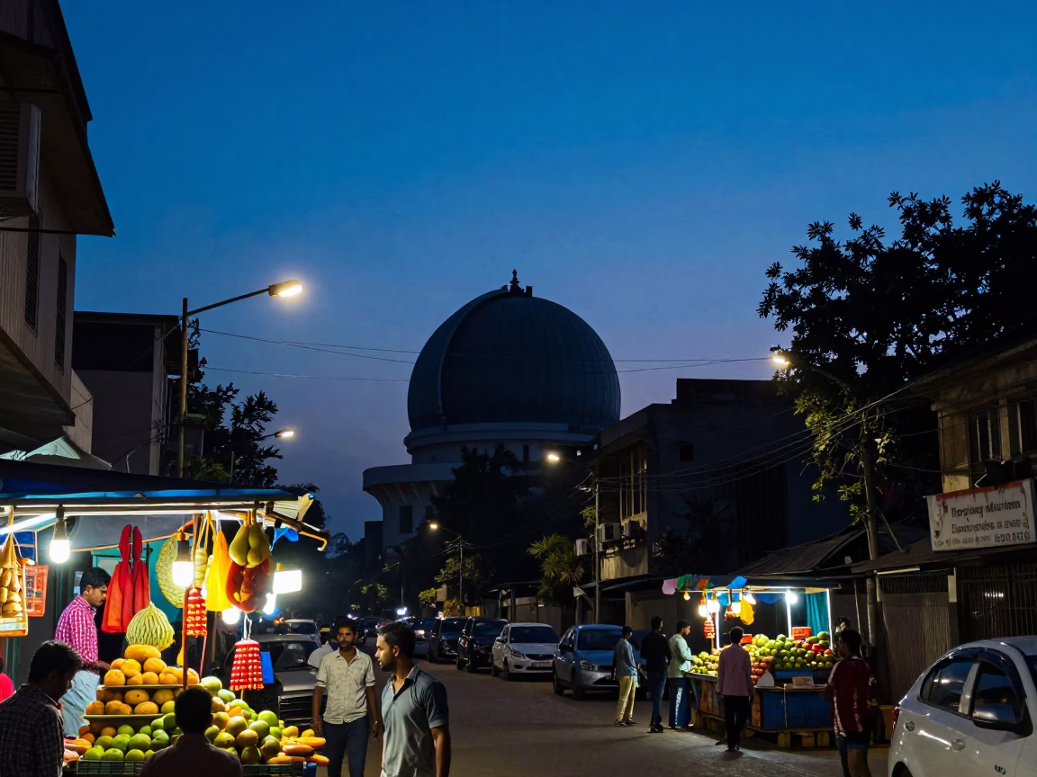 Twilight Street Scene in Hyderabad India with Observatory Dome Silhouette and Local Market Activity in in Hyderabad, India