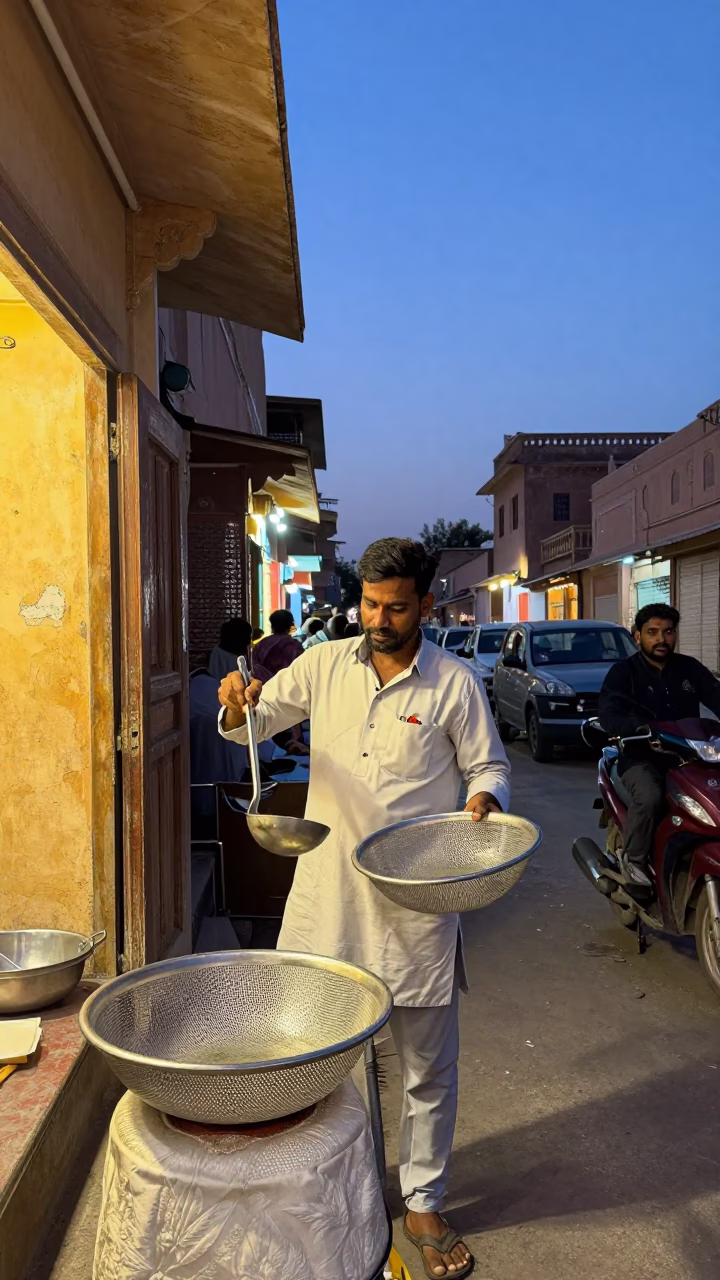 Twilight Street Scene in Jaipur India with Ladle and Mesh Colander in in Jaipur, India