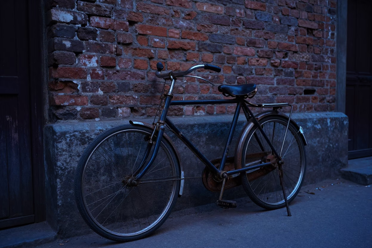 Twilight Street Scene in Kolkata India with Vintage Bicycle and Rusty Bucket in in Kolkata, India