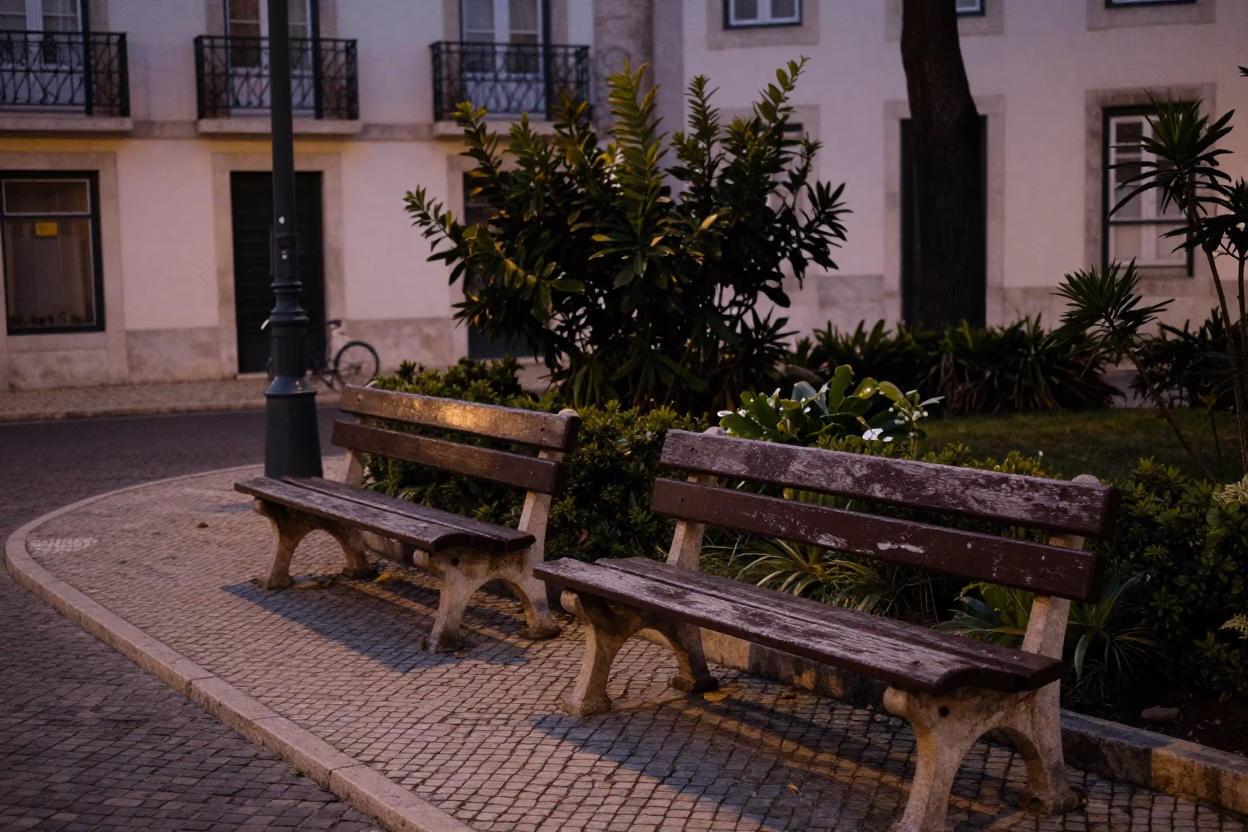 Twilight Street Scene in Lisbon Portugal with Garden Benches and Vintage Sports Car in in Lisbon, Portugal