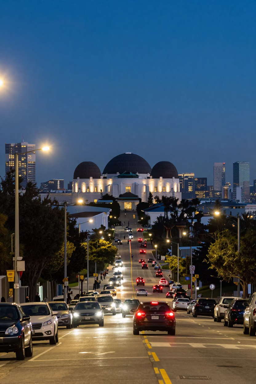 Twilight Street Scene in Los Angeles with Observatory Dome and City Lights in in Los Angeles, California, United States