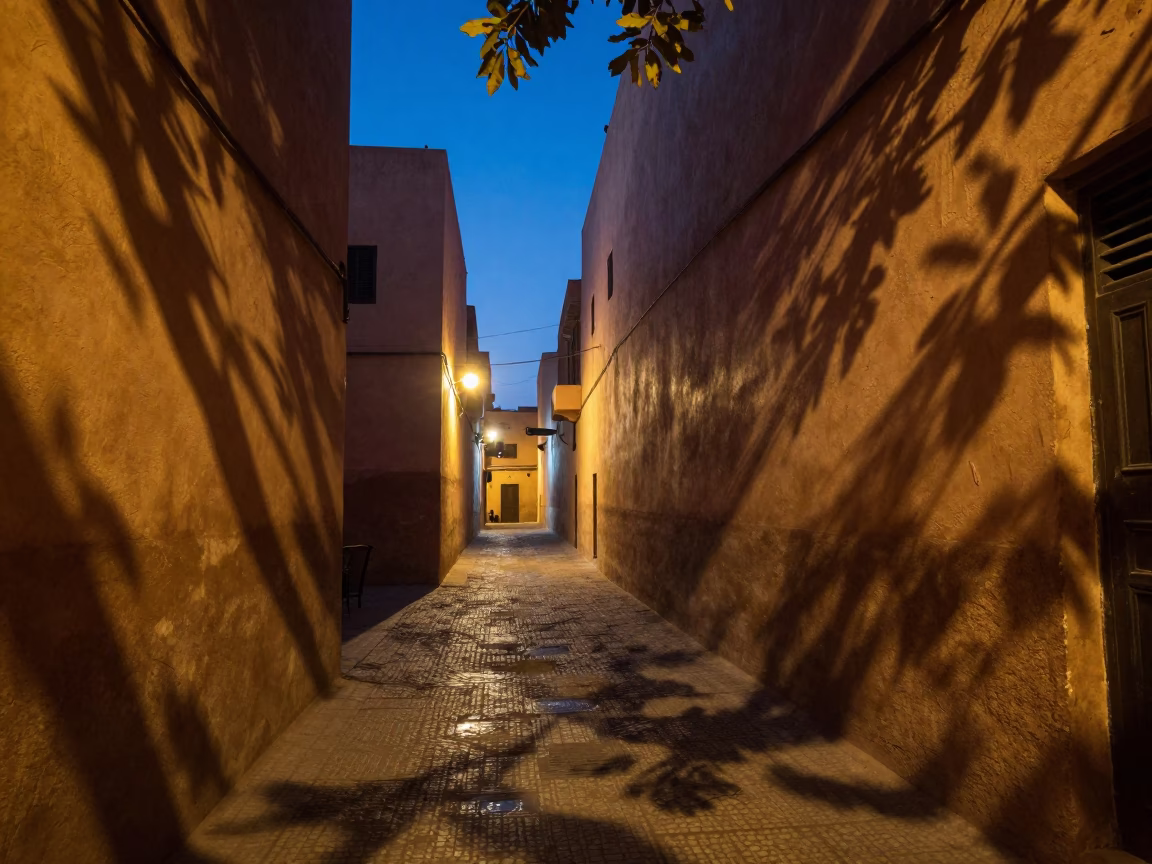 Twilight Street Scene in Marrakech Morocco with Leaf Shadows and Water Tower in in Marrakech, Morocco