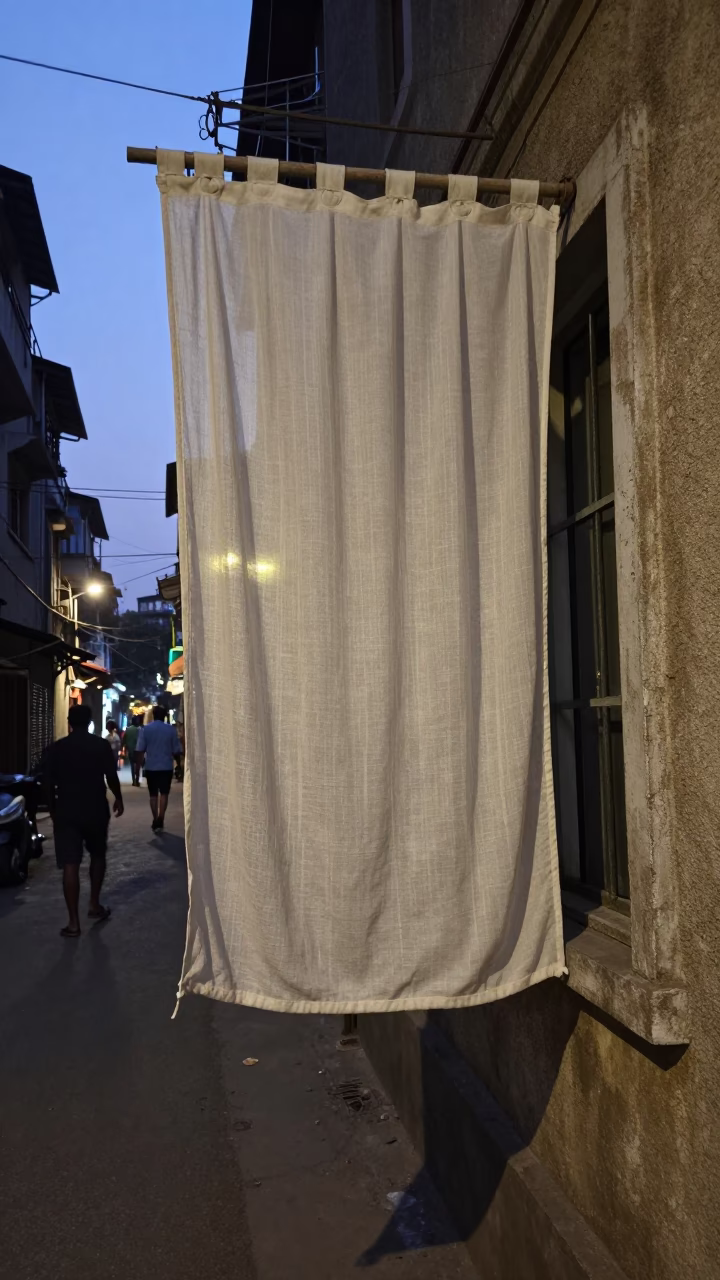 Twilight Street Scene in Mumbai India with Hanging Linen Curtains and Colorful Scarves in in Mumbai, India