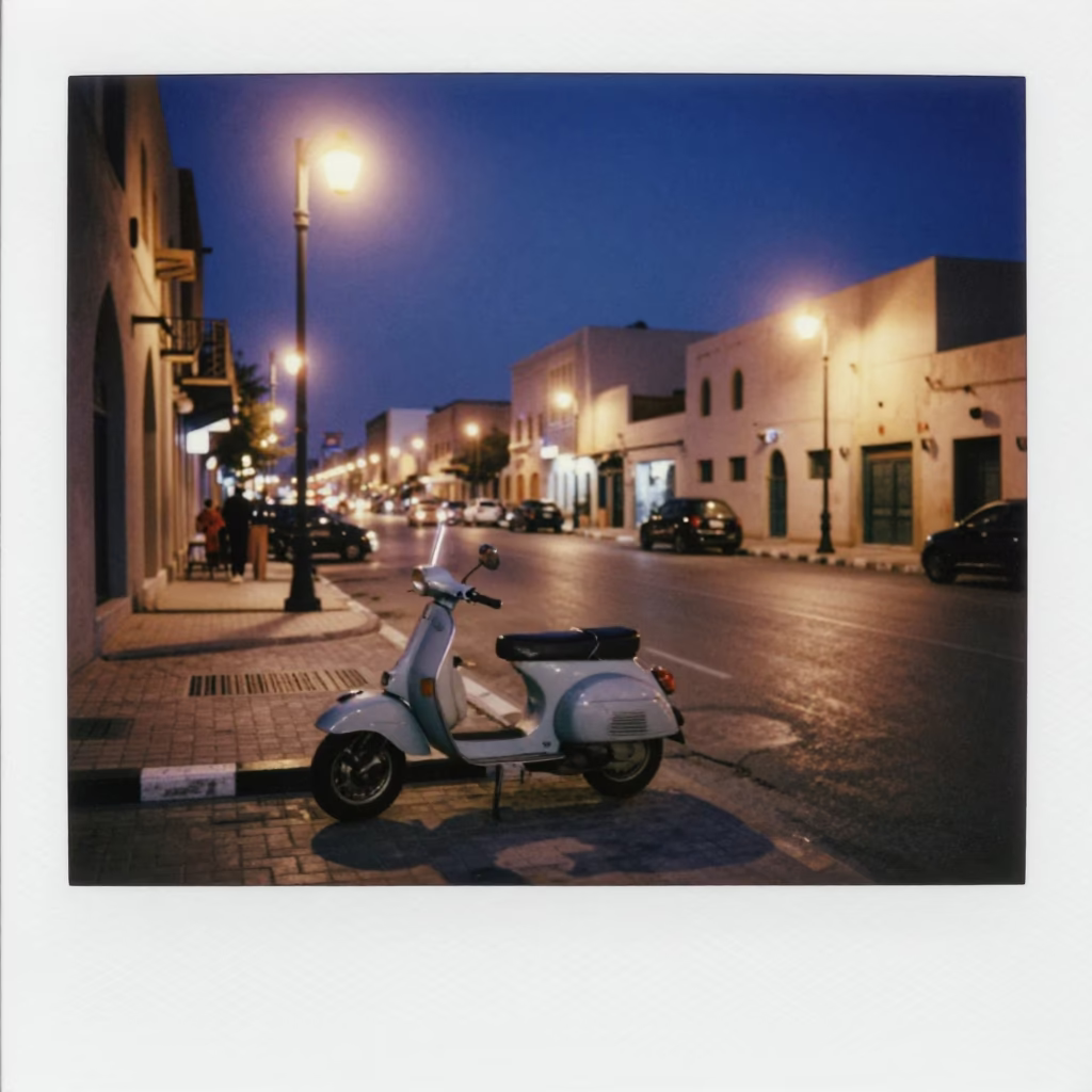 Twilight Street Scene in Muscat Oman with Vintage Vespa and Local Traffic in in Muscat, Oman
