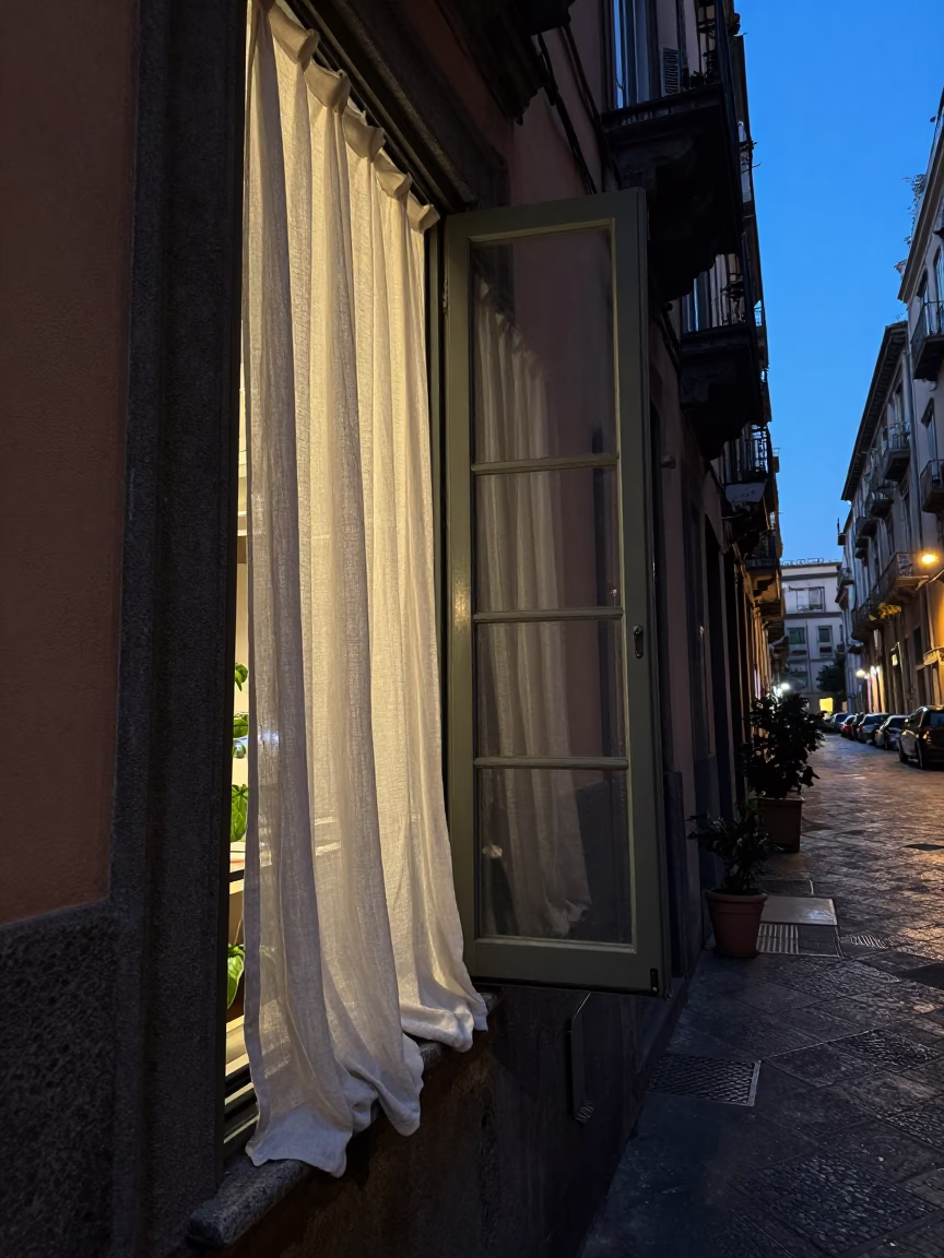 Twilight Street Scene in Naples Italy with Linen Curtains and Basil Pot in in Naples, Italy