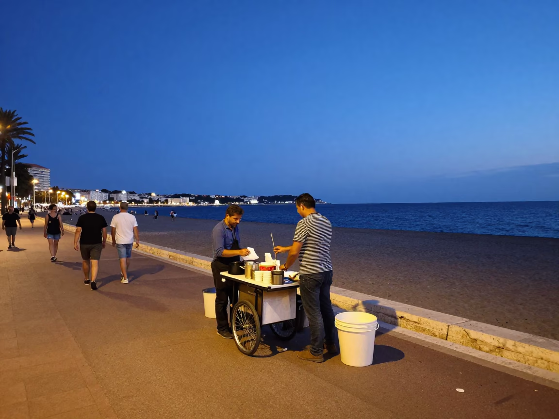 Twilight Street Scene in Nice France with Local Vendor and Pedestrians in in Nice, France