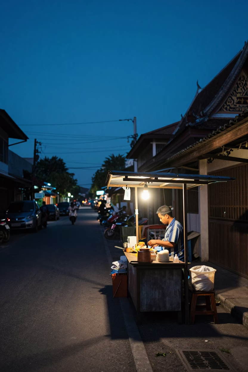 Twilight street scene in Phuket Thailand with local vendor and traditional architecture in in Phuket, Thailand
