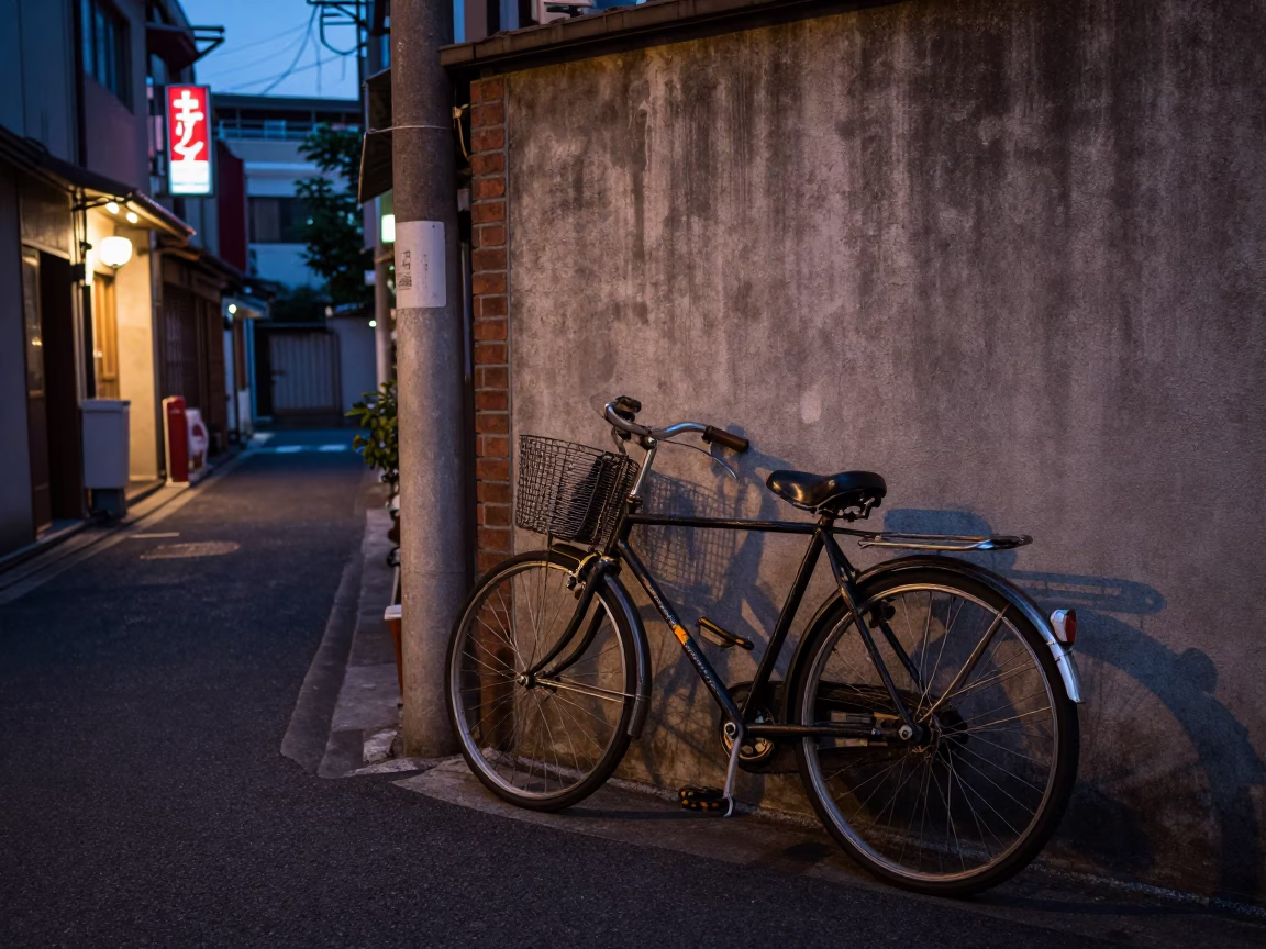 Twilight Street Scene in Tokyo Japan with Vintage Bicycle and Neon Signs in in Tokyo, Japan