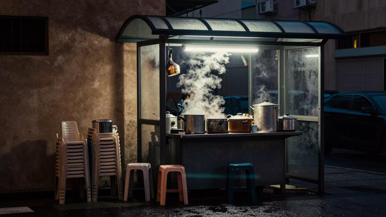 Twilight Tea Stand Alley Dubai Drizzle in beside a steamed-up bus shelter in Dubai