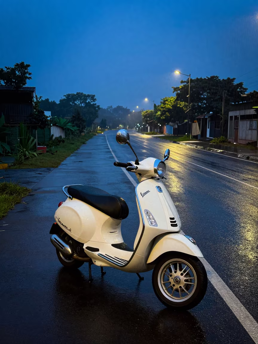 Twilight Vespa in Shadow M'Bour Piazza in along a switchback approach near M'Bour