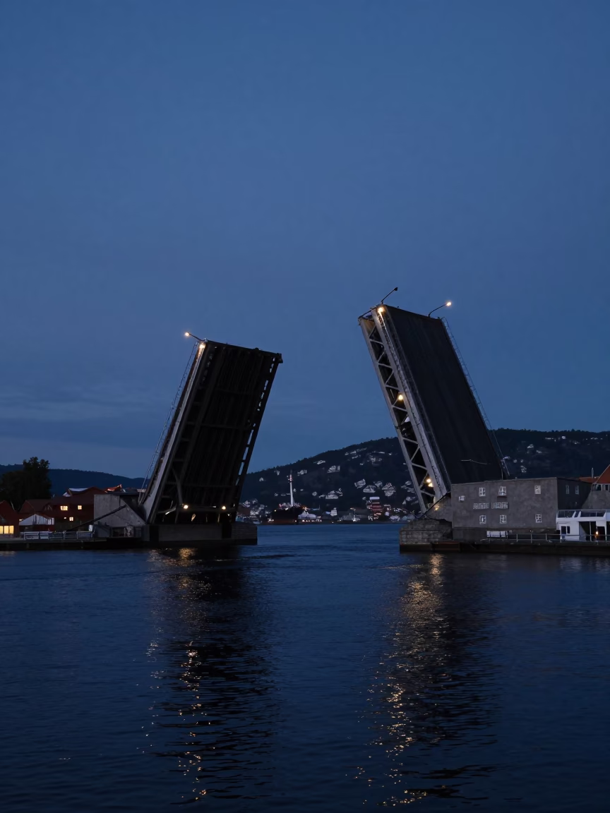 Twilight View of Bergen Norway Drawbridge Lifting Over Dark Tidal Channel Water in in Bergen, Norway