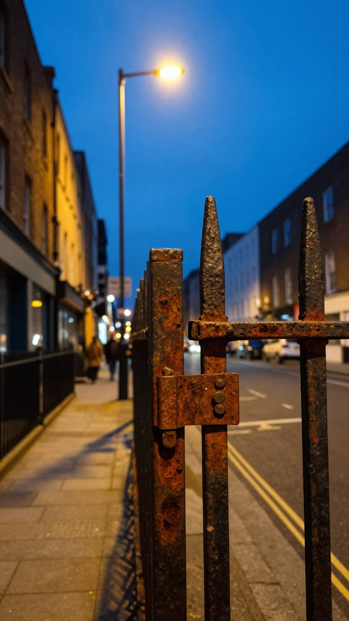 Twilight View of Dublin Street Corner with Rusty Hinge and Sodium Lamps in in Dublin, Ireland