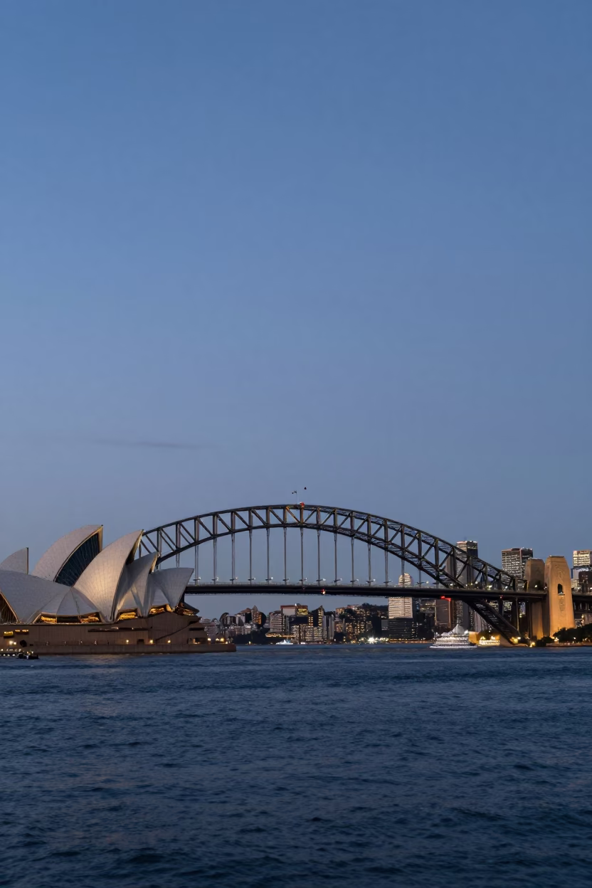 Twilight View of Sydney Harbour Bridge and Opera House from Circular Quay in in Sydney, New South Wales, Australia