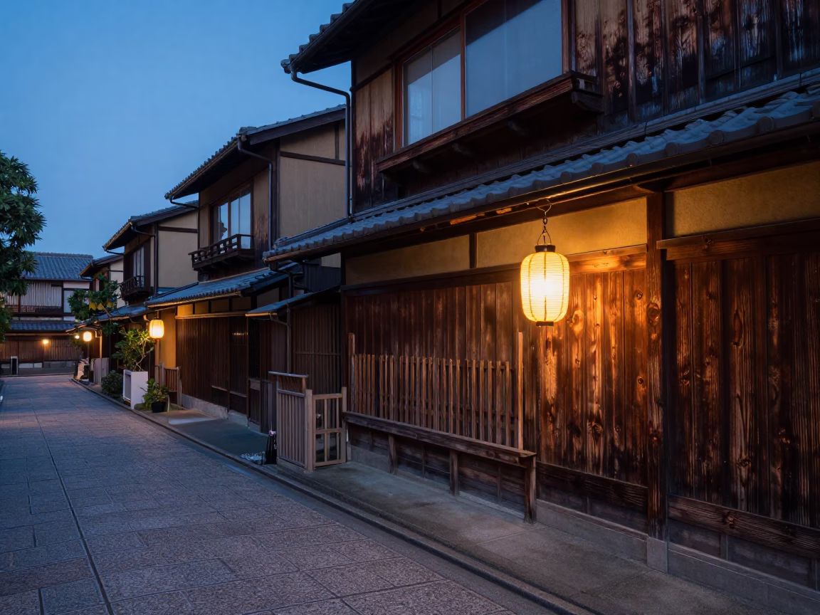 Twilight View of Traditional Kyoto Machiya House with Wooden Lattice and Street Lamp in in Kyoto, Japan