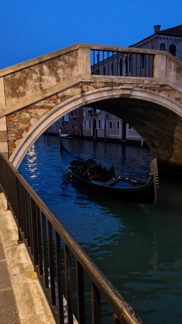 Twilight View of Venice Italy Canals and Stair Rails with Local Life in in Venice, Italy