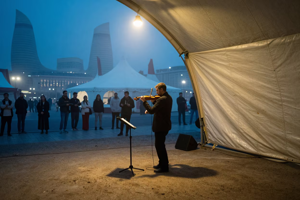 Twilight Violinist Under Circus Tent in Baku in under a circus tent in Baku