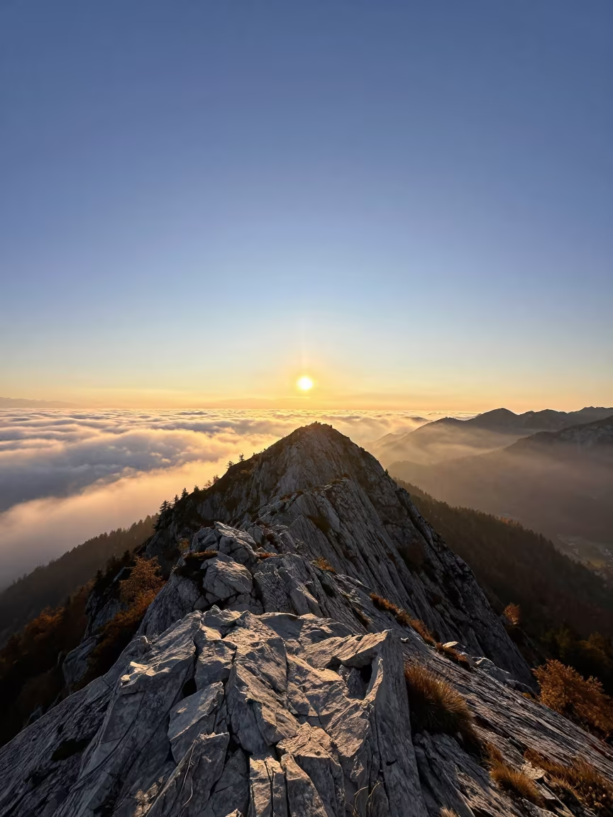 Tyrolean Ridge Above Dawn Clouds at First Light in in Tyrol