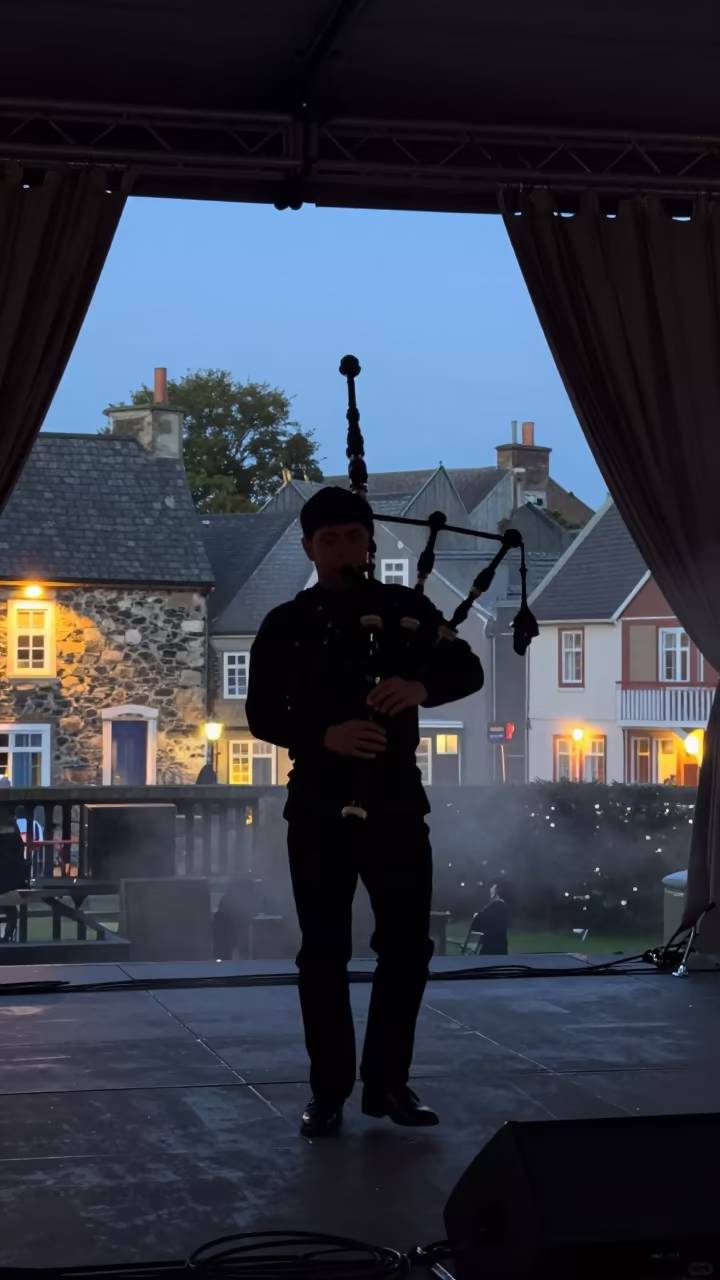 Uilleann Piper Silhouette Festival Stage Willemstad in on a festival main stage in Willemstad