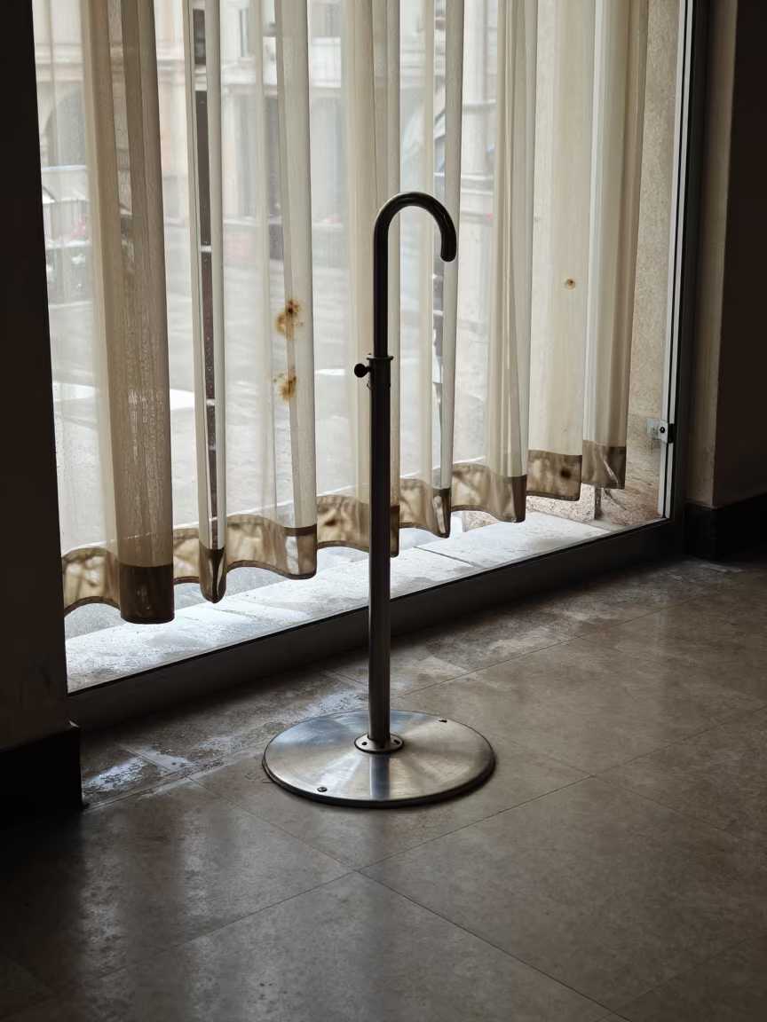 Umbrella Stand on Venice Pier Noon Light in on a pier railing in San Marco, Venice