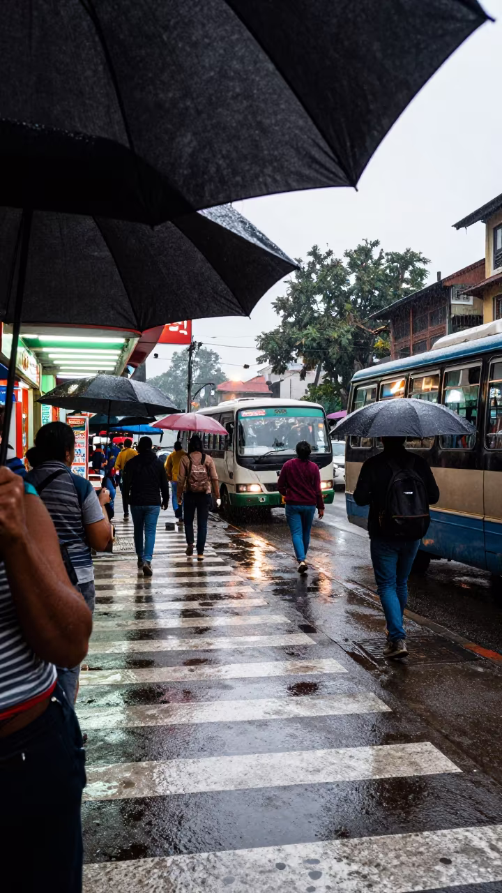 Umbrellas Crowded Crosswalk Sleet Noon Pokhara in outside a fluorescent convenience store in Pokhara