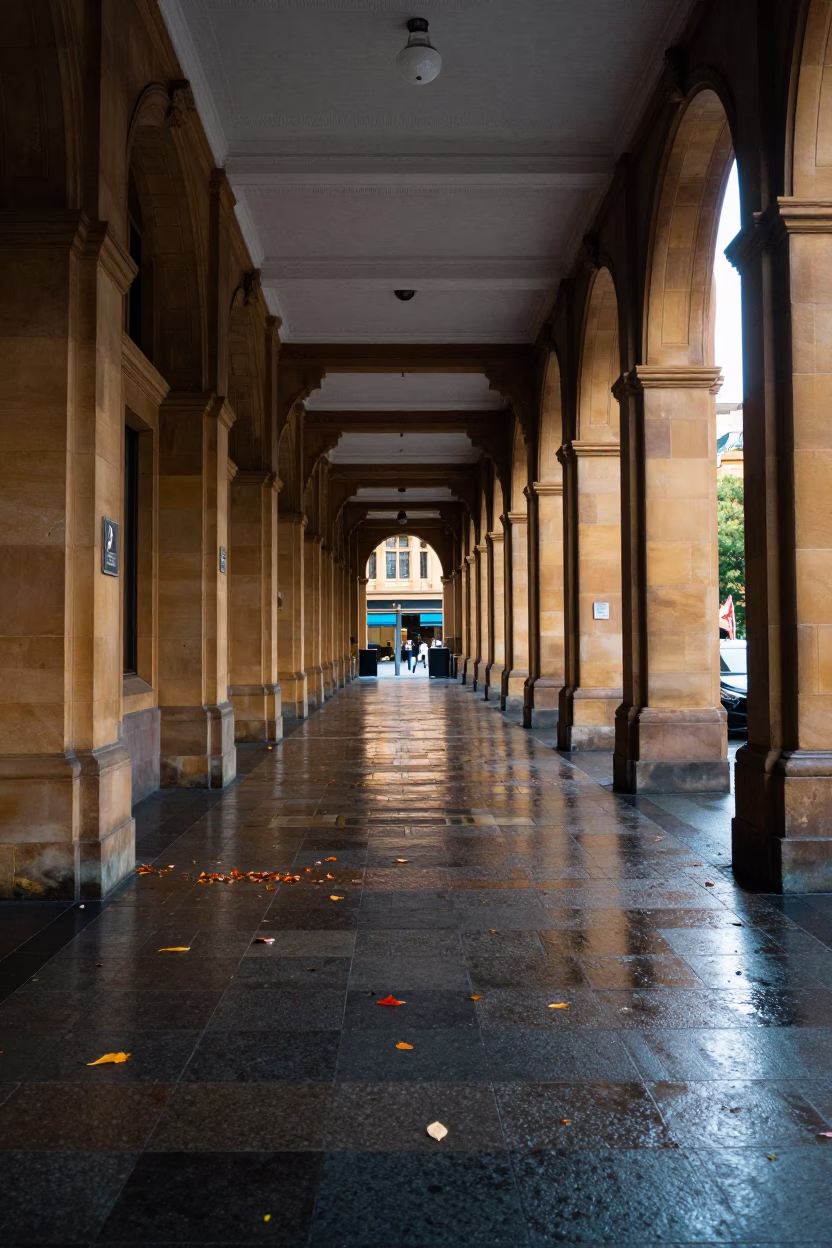 University Arcade Wet Leaves Skittering Between Columns Early Afternoon Melbourne Victoria Australia in in Melbourne, Victoria, Australia