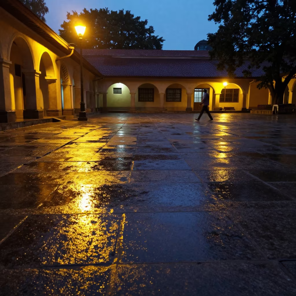 University Cloister Rain Afterglow Ranchi in across a rain-washed campus courtyard in Ranchi