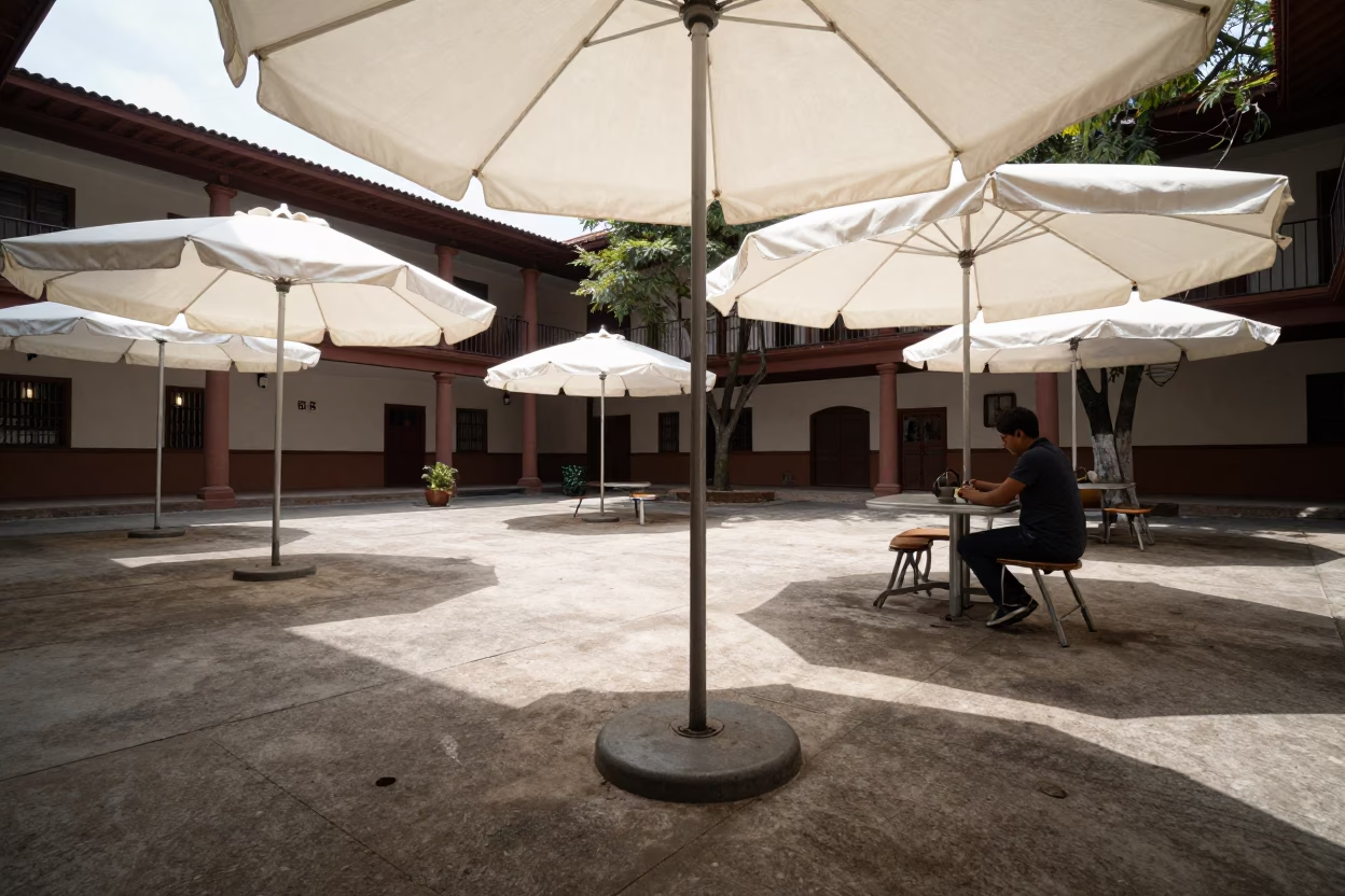 University Courtyard in Merida Mexico with Umbrellas and Tea Kettle in in Merida, Mexico