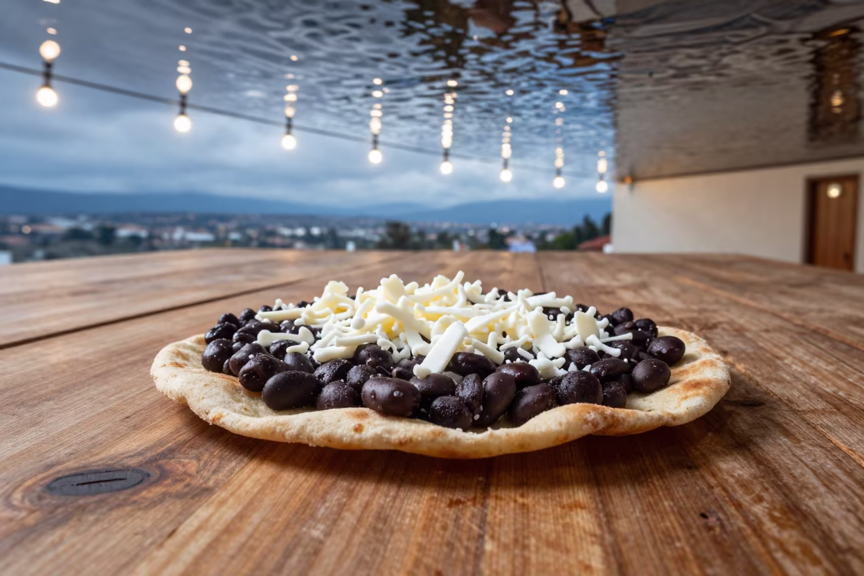 Upside Down Tlayuda Reflection in Water Ceiling in on a rustic wooden table in Birmingham