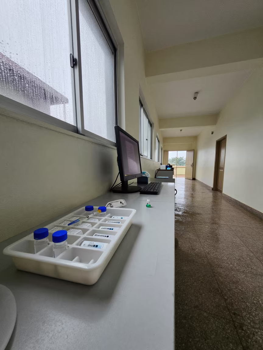 Vaccine Tray on Nurse Station Under Monitor Glow in at a nurse station under monitor glow near Ouagadougou