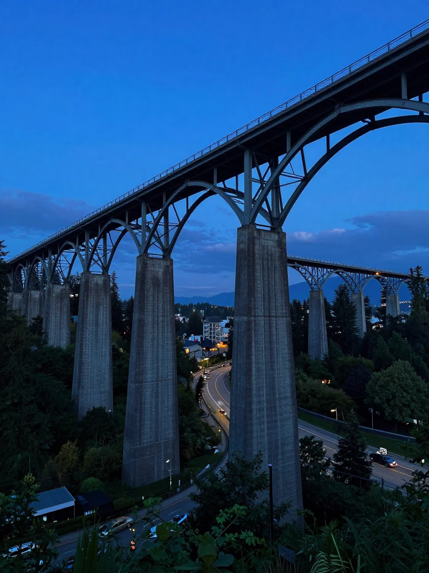 Vancouver British Columbia Dawn Railway Viaduct Arches Over Valley Before Daylight in in Vancouver, British Columbia, Canada