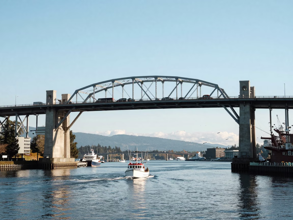 Vancouver Burrard Street Bridge Traffic and Harbor Life in Bright Midmorning Light in in Vancouver, British Columbia, Canada