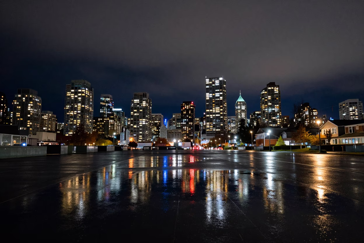 Vancouver Night Skyline Reflections in Rain Puddles at Deep Night in in Vancouver, British Columbia, Canada