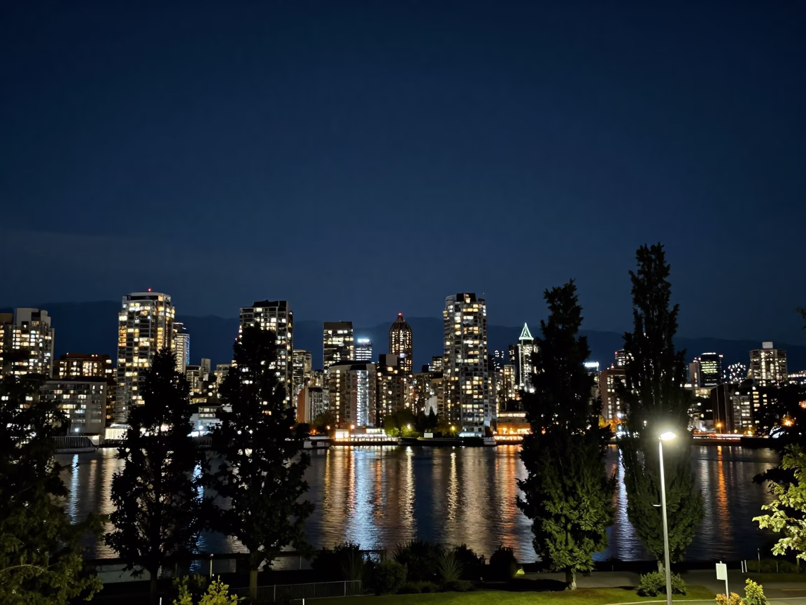 Vancouver Night Skyline with Cypress Trees and Streetlights Under Deep Night in in Vancouver, British Columbia, Canada