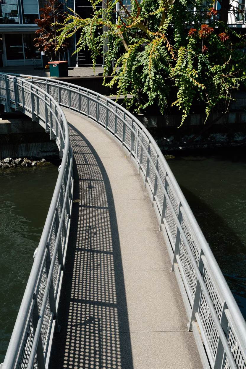 Vancouver Pedestrian Overpass Perforated Metal and Vine Greenery in Bright Midmorning Light in in Vancouver, British Columbia, Canada