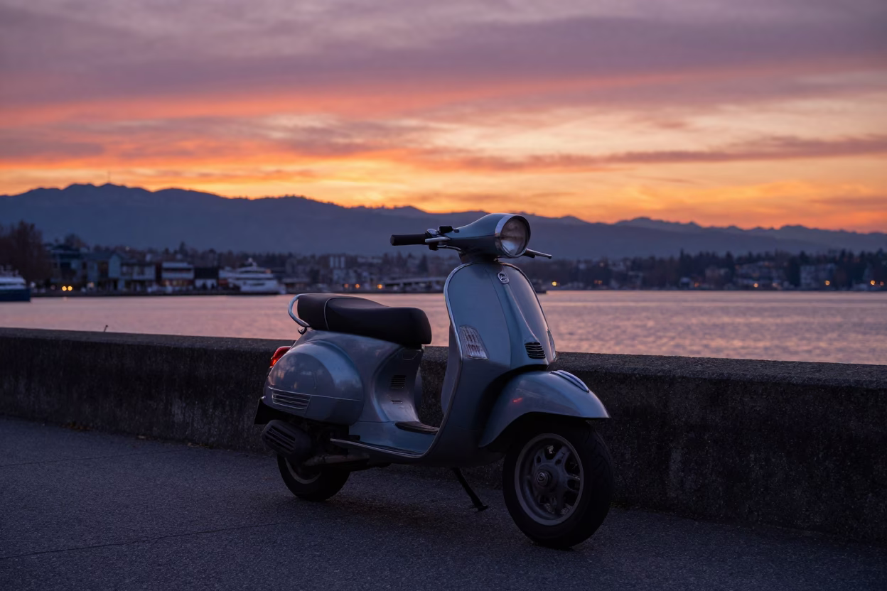 Vancouver Sunset Harbor Scene with Parked Scooter and Concrete Breakwater in in Vancouver, British Columbia, Canada