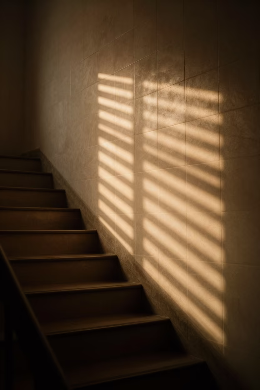Venetian Blind Shadows on Tiled Stair Wall in inside a tiled stair hall in Gaya