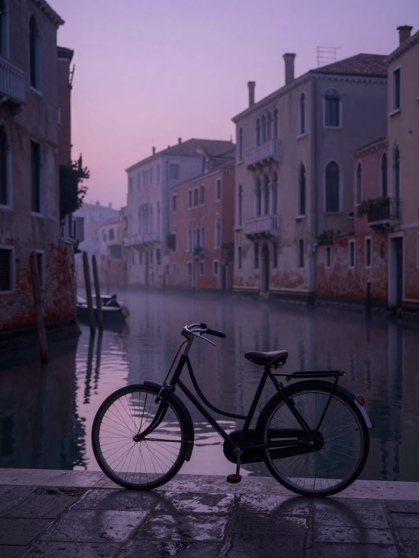Venetian Dawn Canal Scene with Antique Bicycle and Morning Mist in Italy in in Venice, Italy