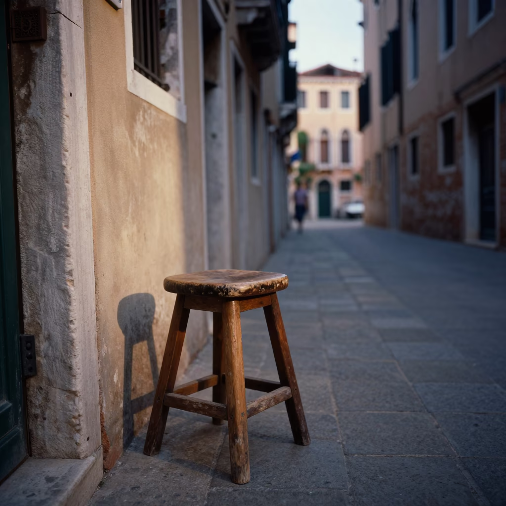 Venetian Street Scene Late Afternoon with Wooden Stool and Steam Haze in in Venice, Italy