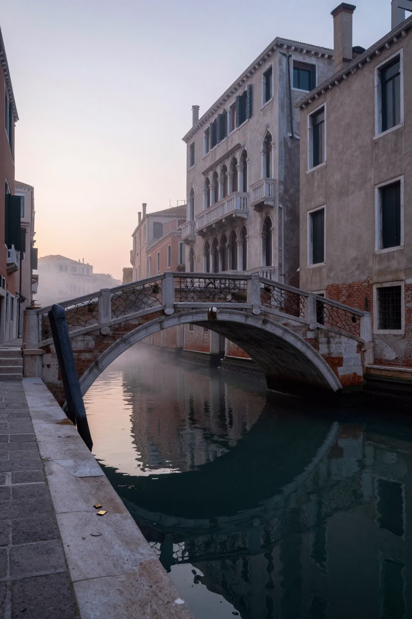 Venice Canal Bridge at Dawn with Padlock and Steam Haze Before Sunrise in in Venice, Italy