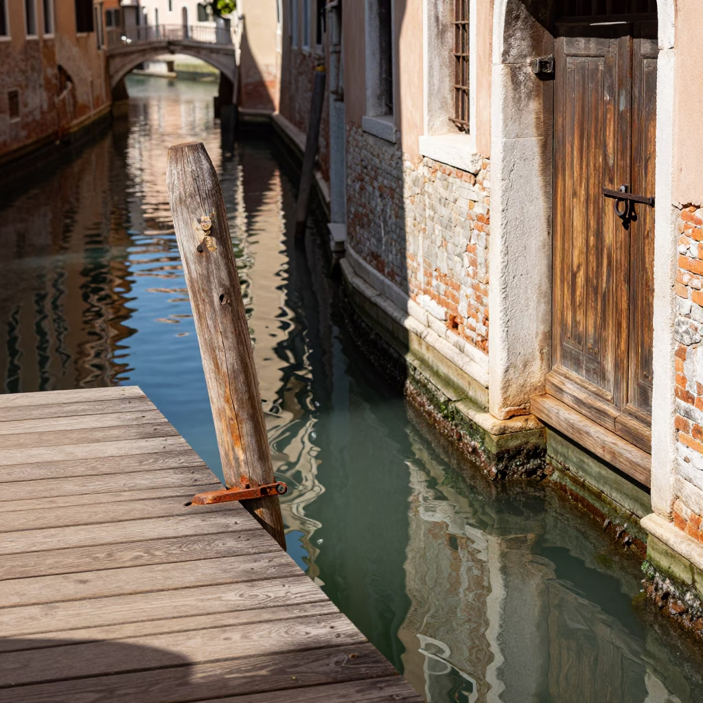 Venice Canal Midday Rust Latch on Wooden Dock with Carnival Mask Nearby in in Venice, Italy