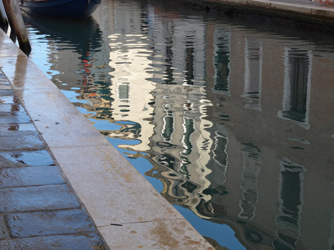 Venice Canal Noon Light Reflected in Wet Cobblestones with Tramcar in in Venice, Italy