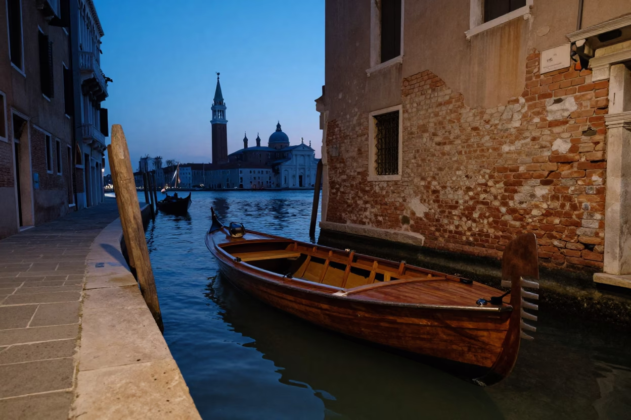 Venice Evening Canal Scene with Wooden Boat and Stone Architecture in Blue Light in in Venice, Italy