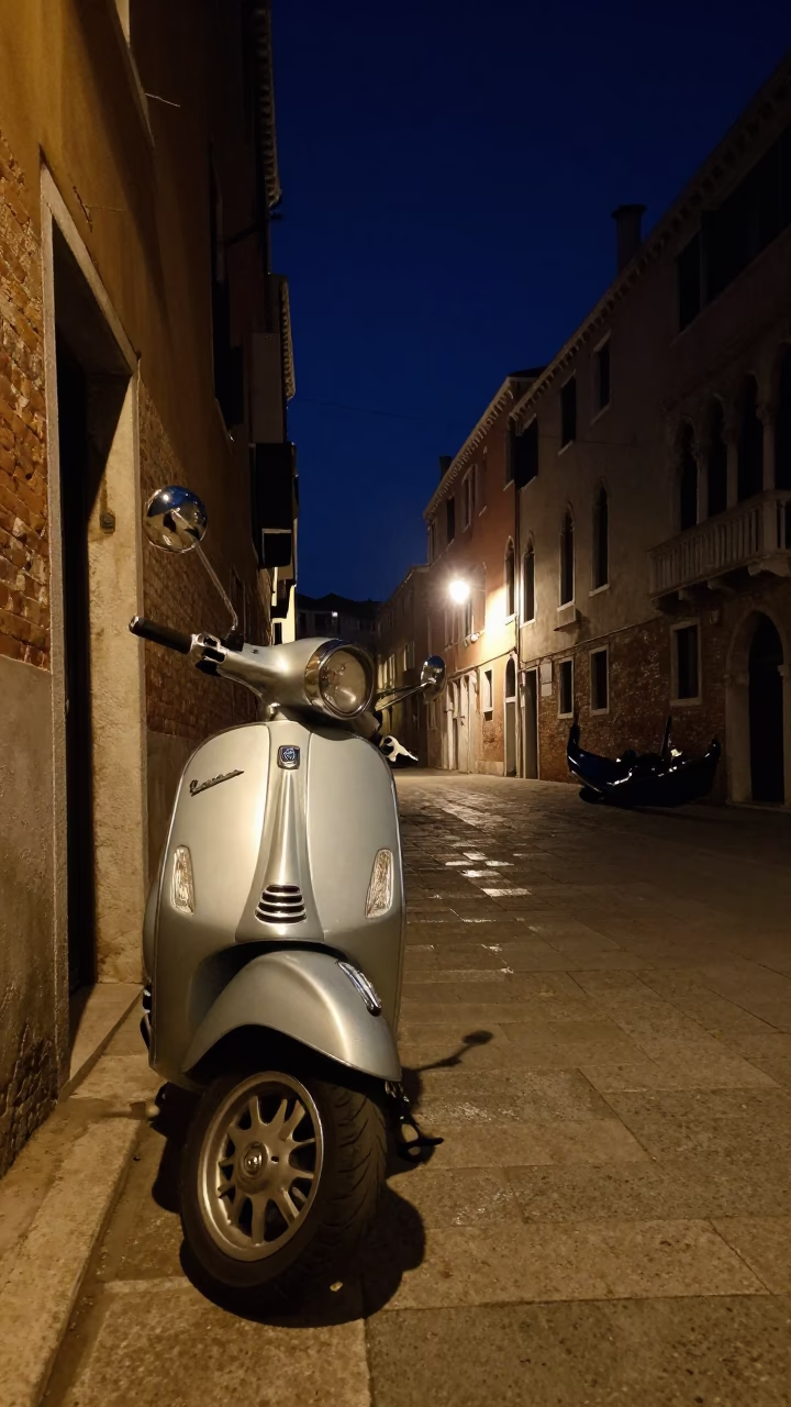 Venice Italy Deep Night Street Scene with Vespa Reflection in Shop Window in in Venice, Italy